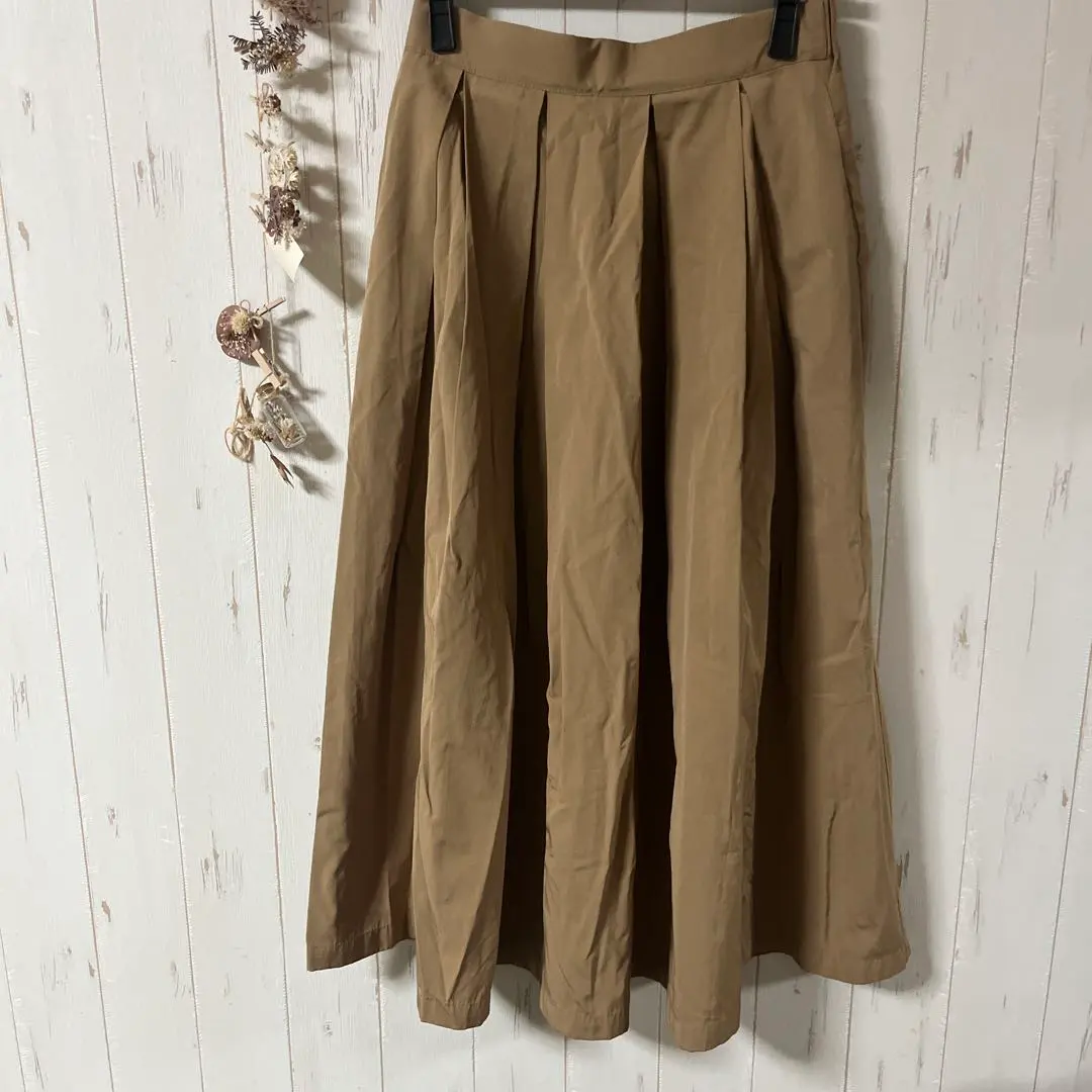 Thumbnail of Beige satin-style flared long skirt