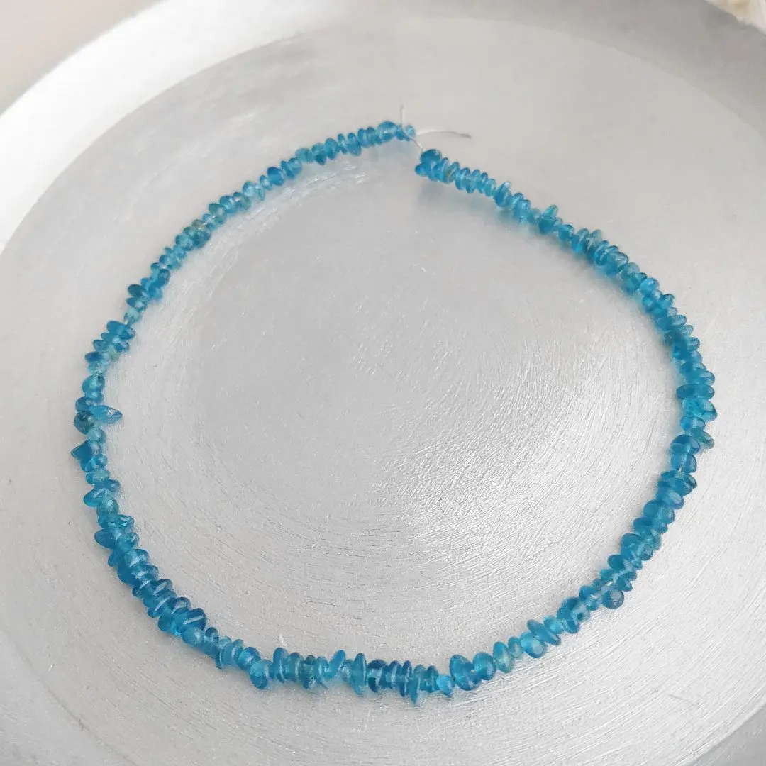 Thumbnail of Gem-quality Neon Blue Apatite AA++ Mini Tumble (approx. 20cm)