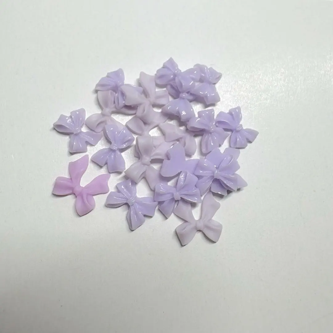 Thumbnail of Purple ribbon nail parts
