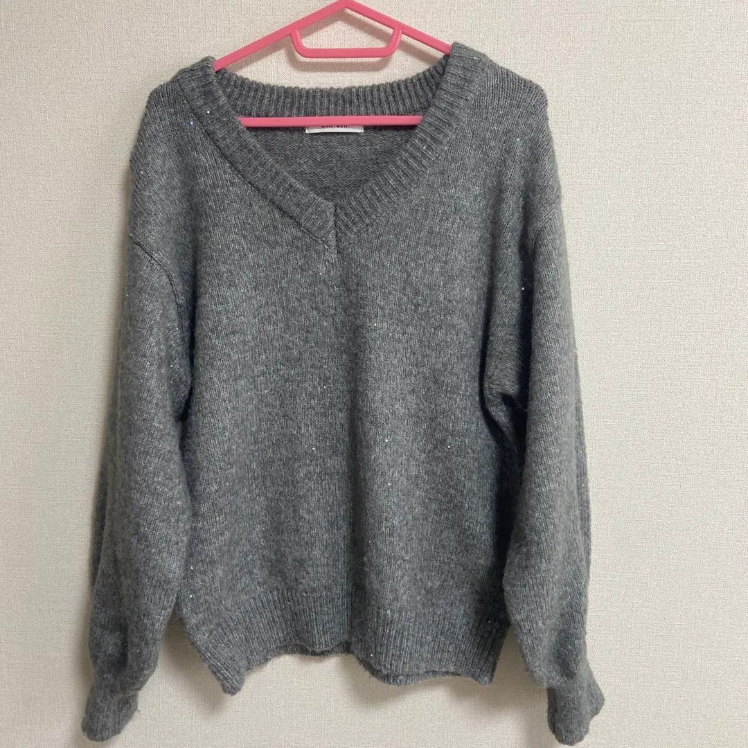 Thumbnail of Gray V-neck knit sweater, long sleeves