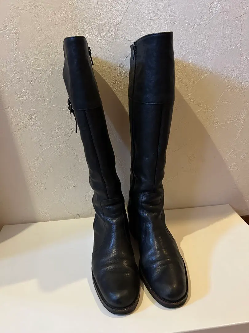 Thumbnail of Black leather long boots
