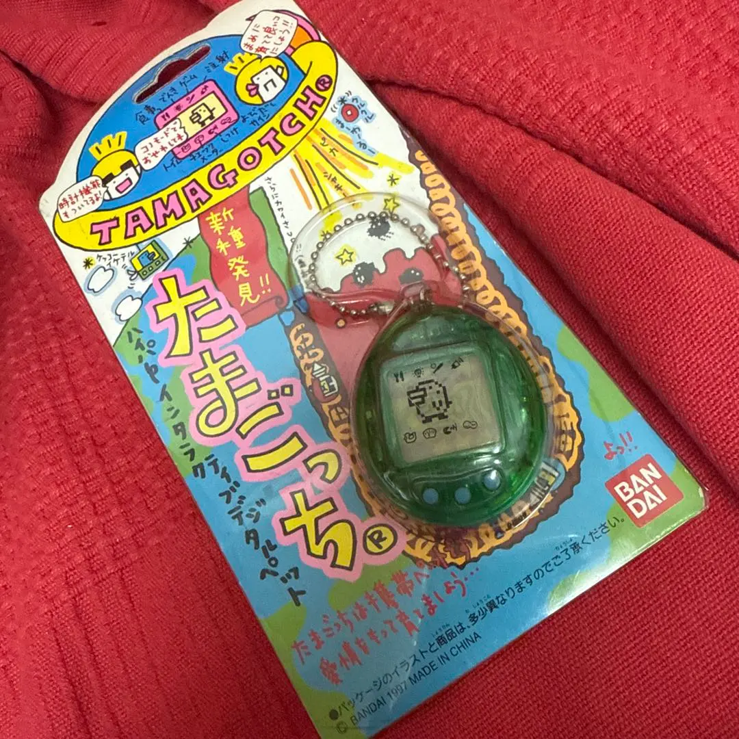 Thumbnail of [Made in 1997] First Generation Tamagotchi Green - Junk Condition