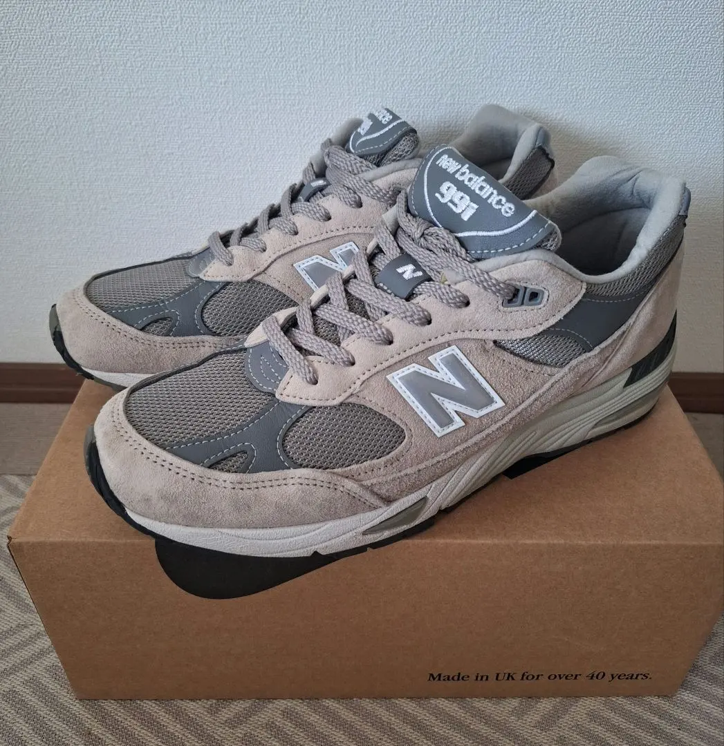 Thumbnail of New Balance 991 UK Gray Sneakers, Unused Insoles Included