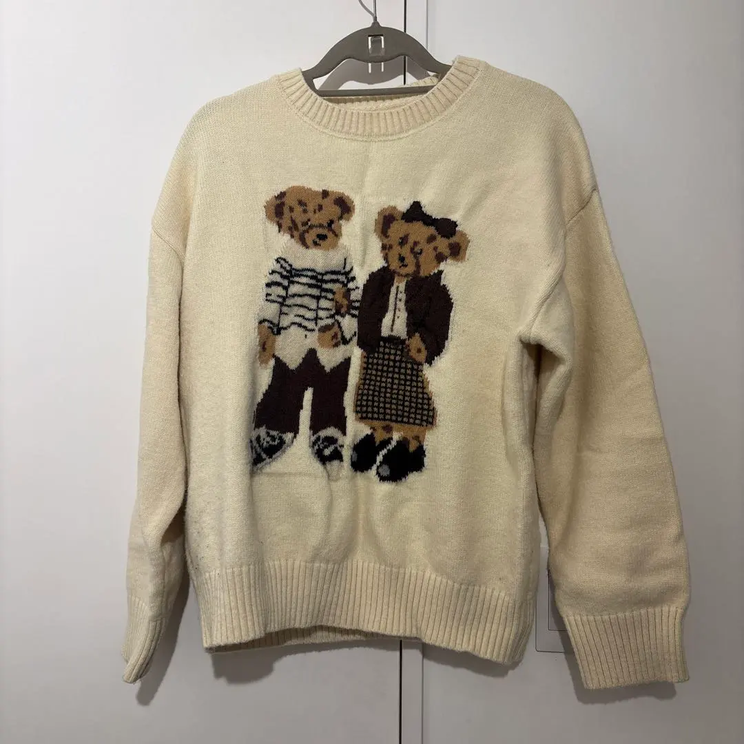 Thumbnail of Cream-colored knit sweater with bear embroidery