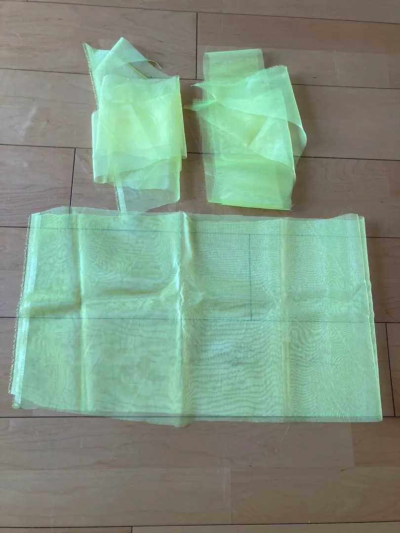 Thumbnail of Yellow organza fabric, 3 cuts, approximately 110cm x 30cm, plus scraps
