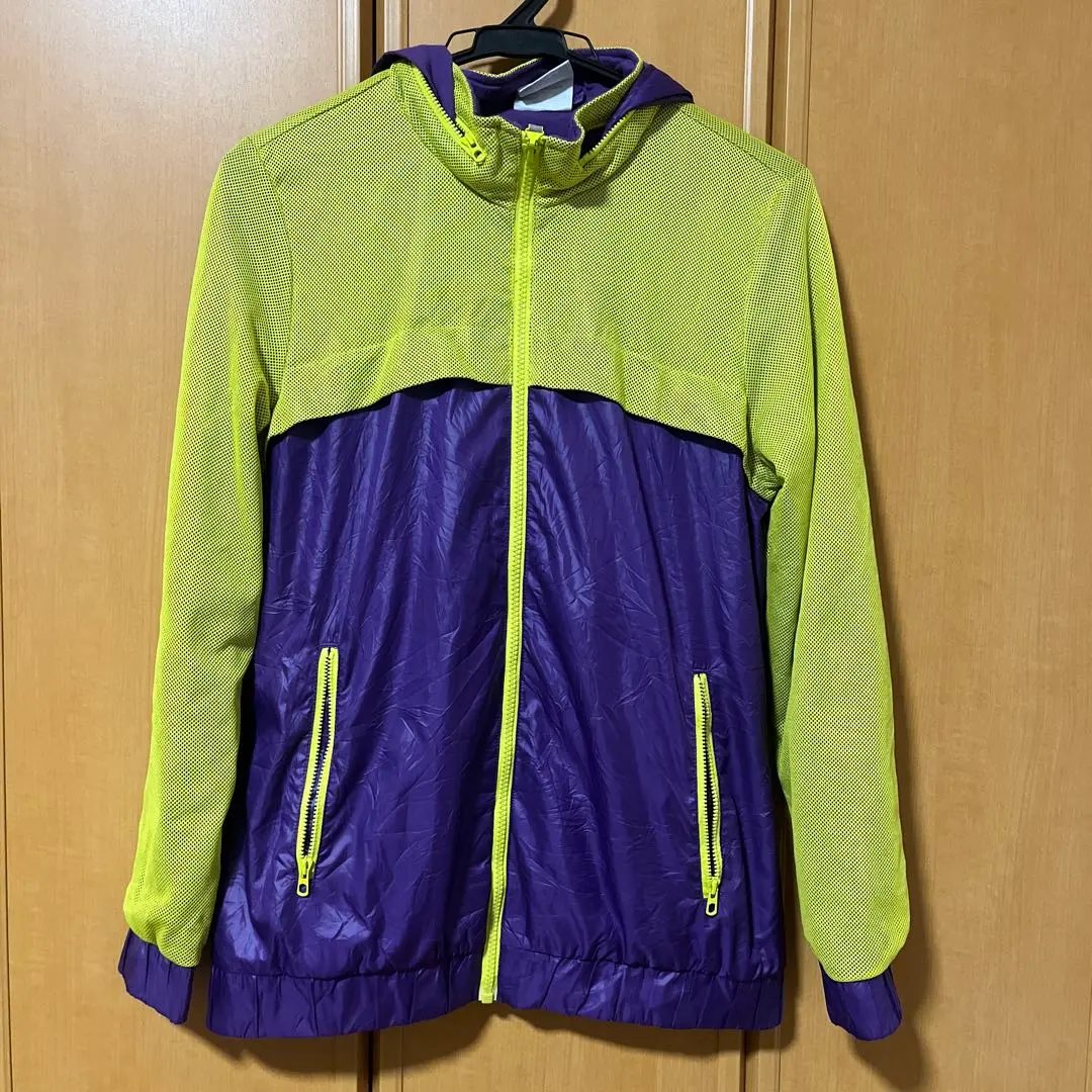 Thumbnail of Adidas mesh windbreaker, size M, purple/yellow green