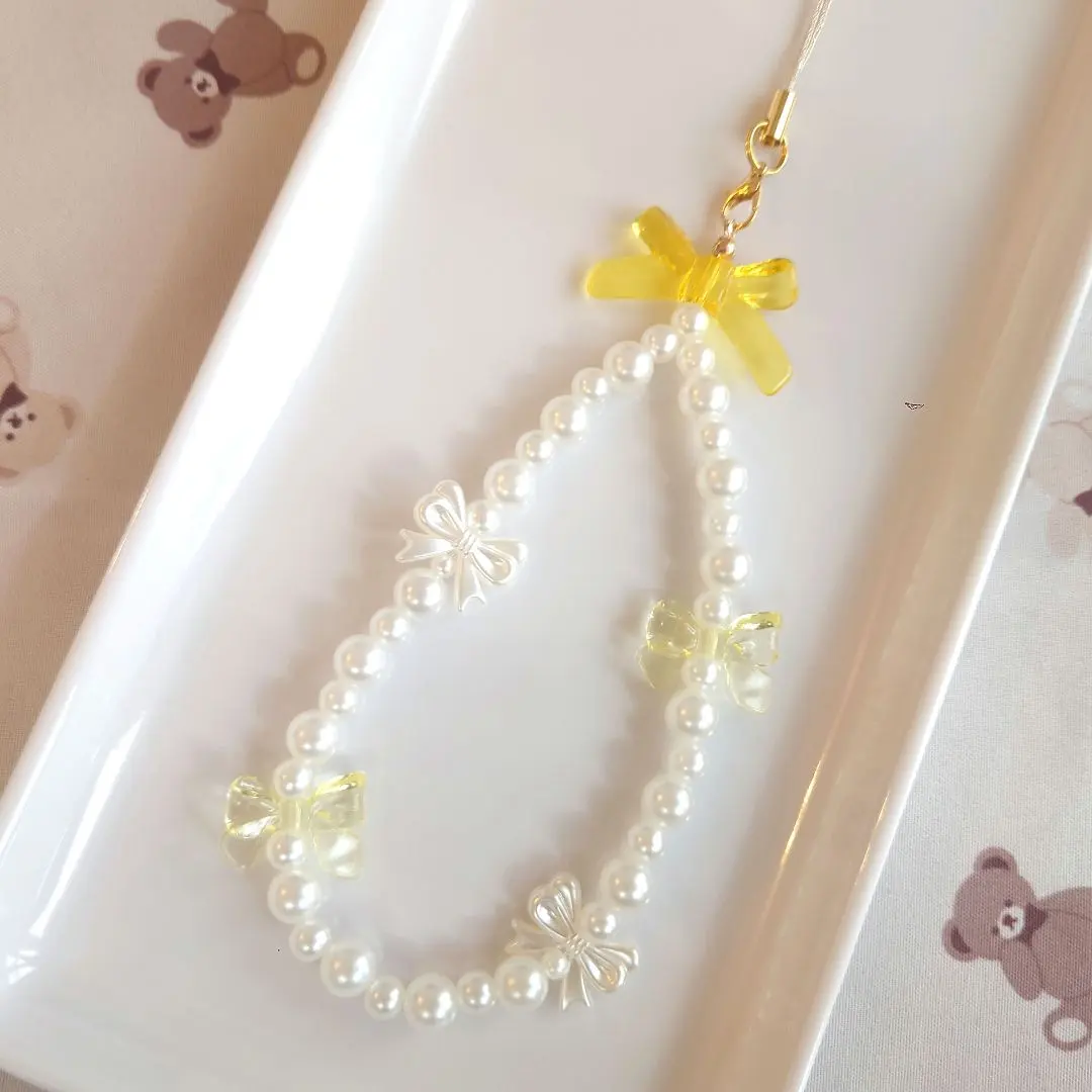 Thumbnail of No. 83: Beaded Strap, Yellow Ribbon, Pearl-like