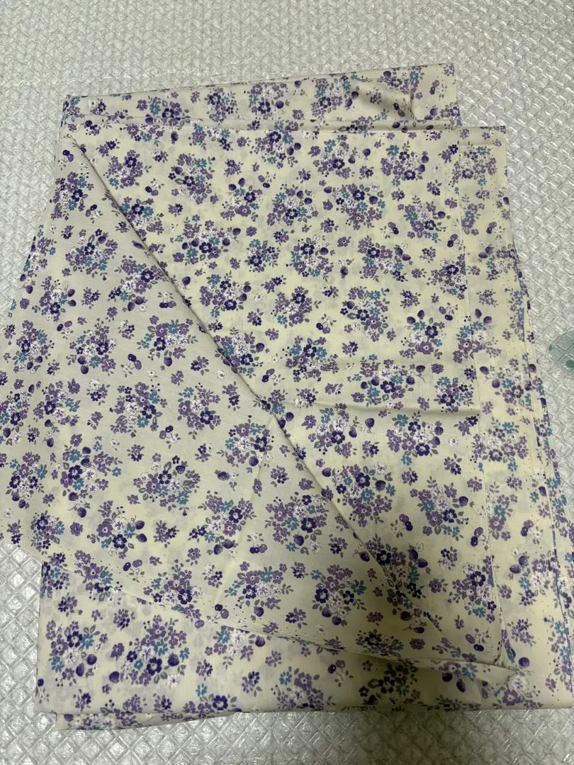 Thumbnail of White cotton fabric with purple floral pattern