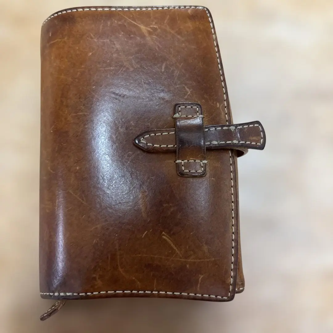 Thumbnail of Brown leather bi-fold wallet