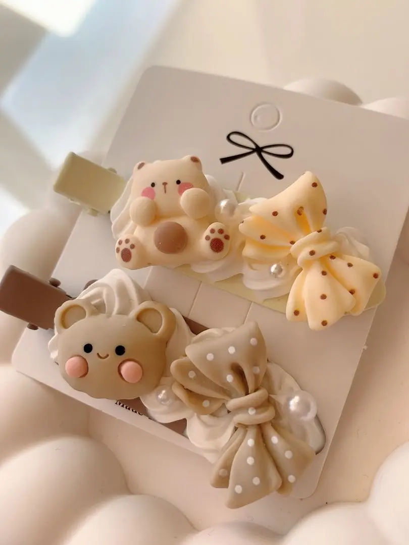 Thumbnail of Set of 2 bear and ribbon hairpins