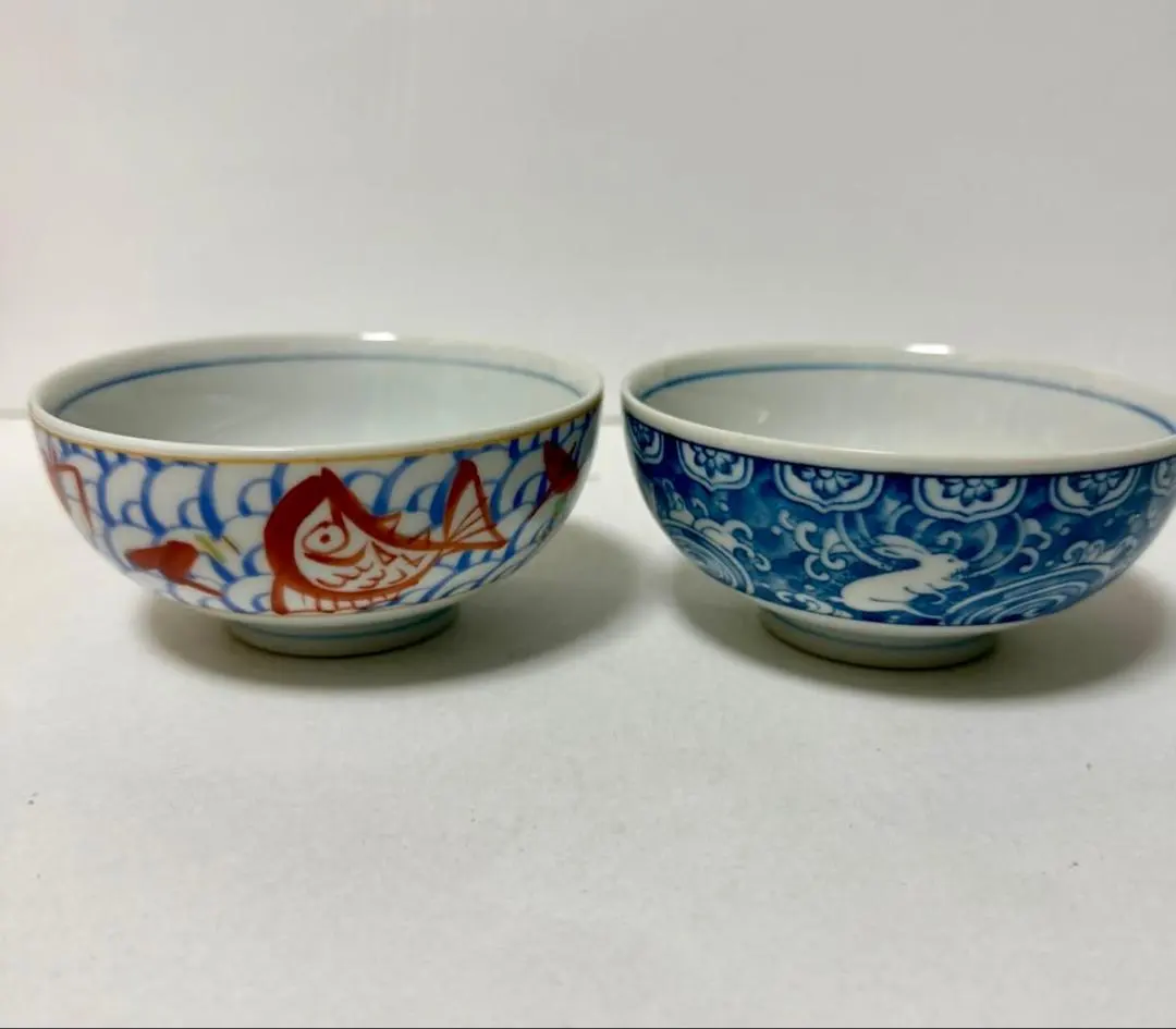 Thumbnail of Pottery tea bowls, set of 2, red fish and blue floral pattern