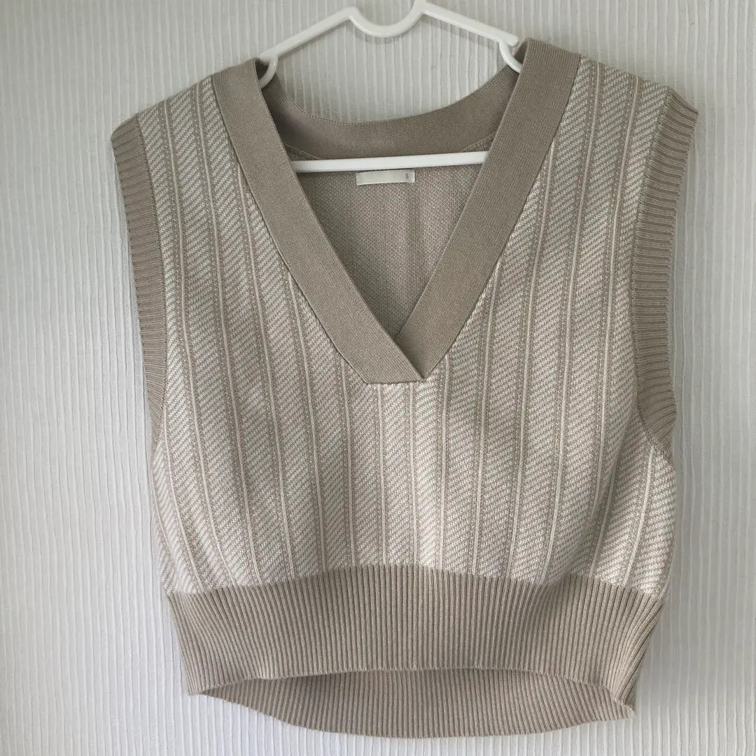 Thumbnail of Beige V-neck knit vest