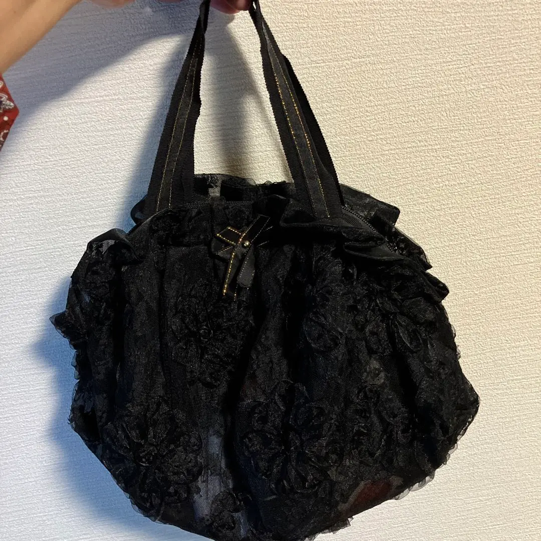 Thumbnail of Price reduced again: Black lace bag
