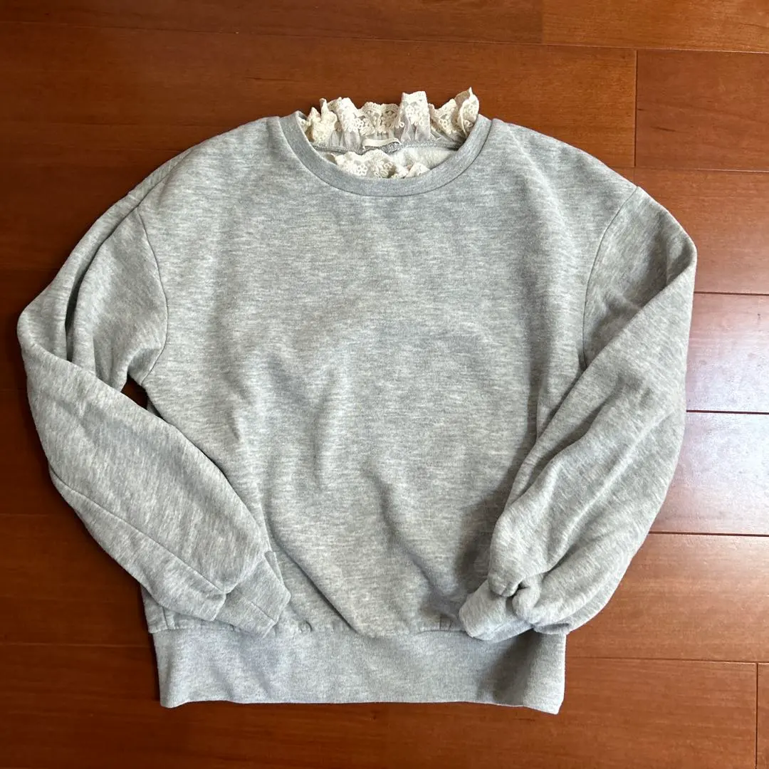 Thumbnail of Gray sweatshirt with frills, size 140