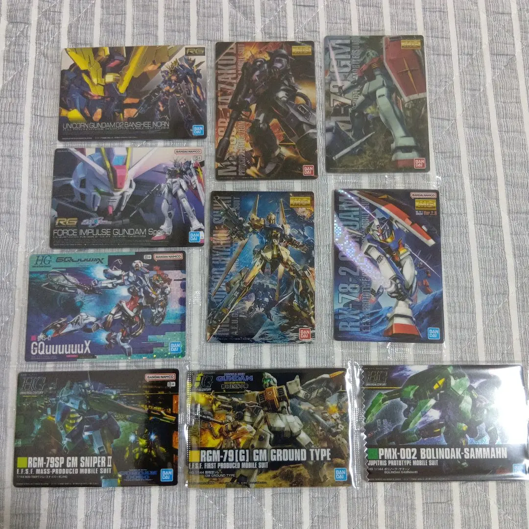 Thumbnail of Gunpla Package Art: Banshee, Force Impulse, GM, Hyaku-Shiki, Zaku, and 10 others.