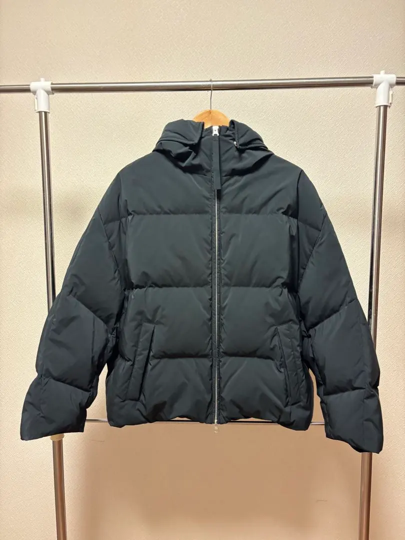 Thumbnail of Black down jacket with hood
