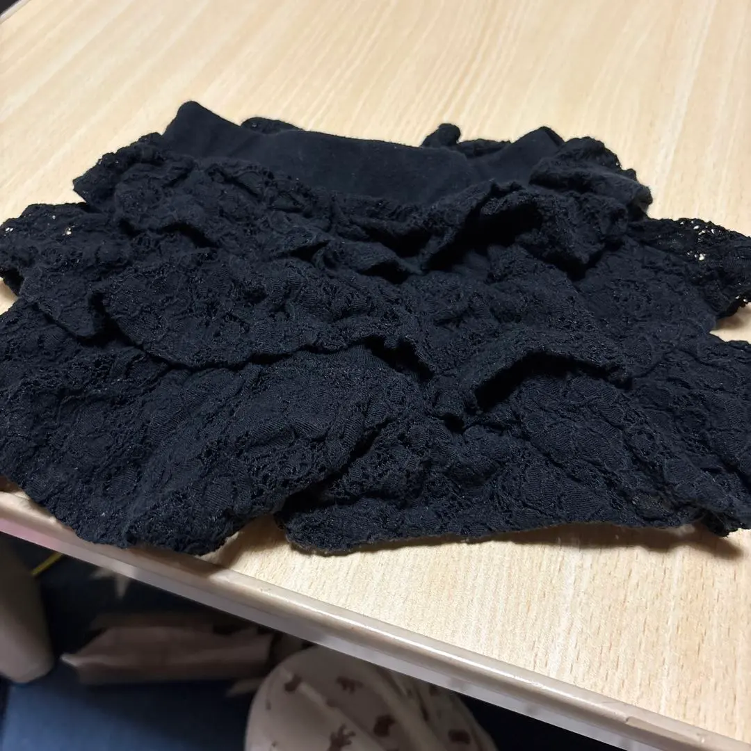 Thumbnail of Black half pants with frills, size 110