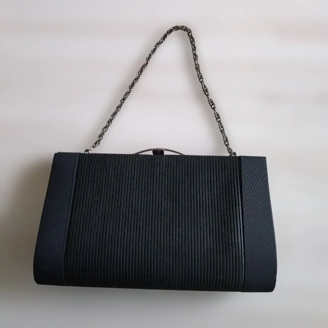 Thumbnail of Black formal bag with stripe design