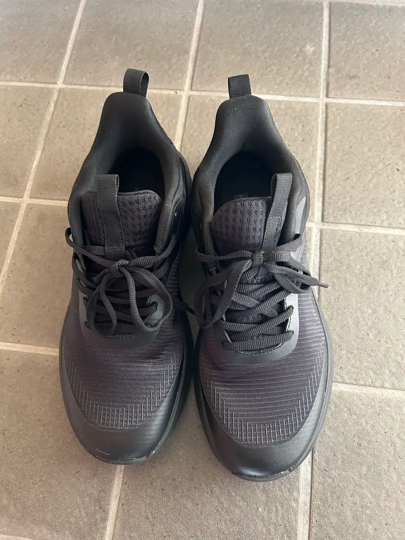 Thumbnail of Black running shoes