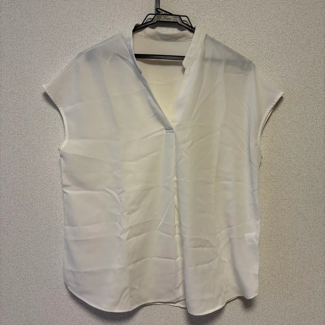 Thumbnail of GU White V-Neck Sleeveless Shirt