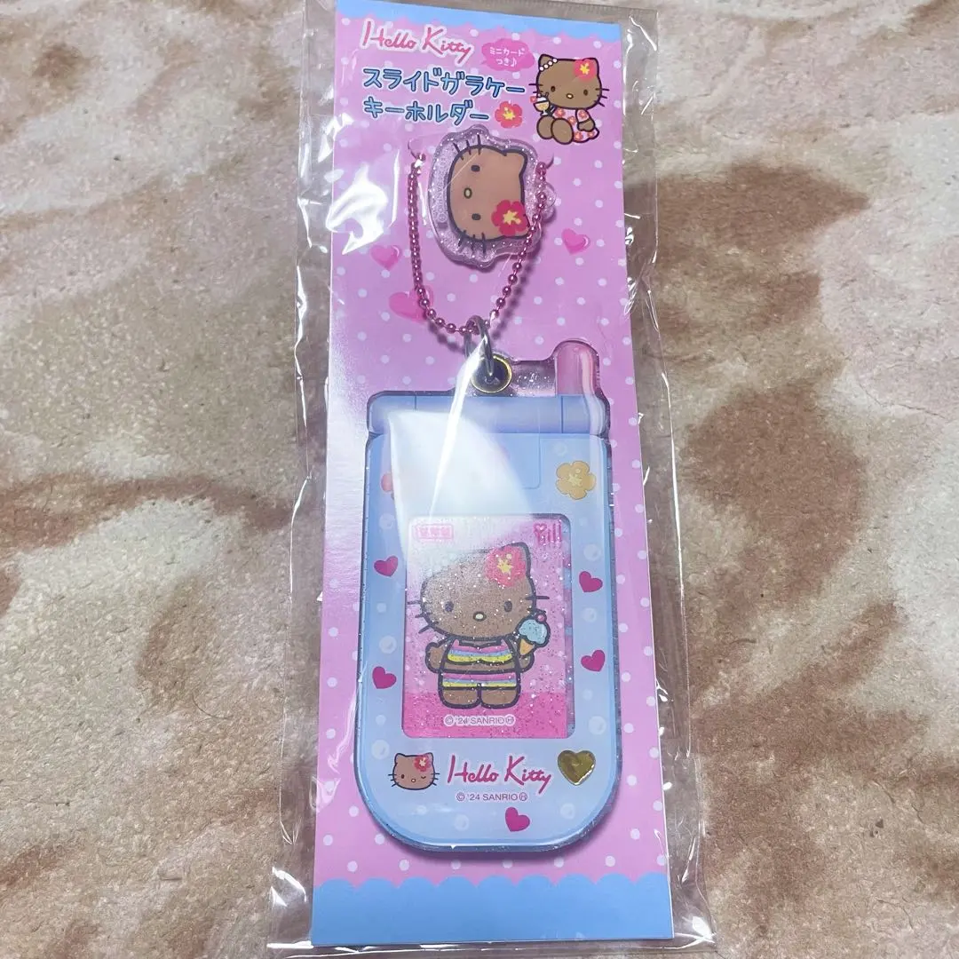 Thumbnail of Unused Hello Kitty Slide Phone Keychain - Gyaru, Sunburned