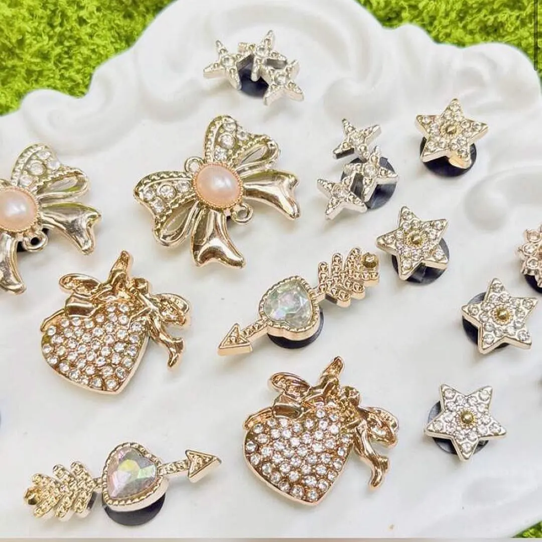 Thumbnail of [8311] 20 Jibbitz Charms - Gold, Ribbons, Hearts, Stars, Crocs