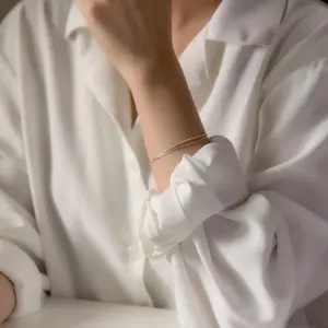 styling/ ラッフルニットベアトップ ベージュ - メルカリ