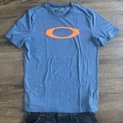 Oakley Tシャツ ブルー オレンジロゴ - メルカリ