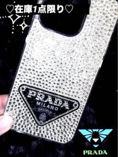 PRADA iPhone14promax用スマホケース　スワロフスキー 直営店買付 PRADA ストラップ付 クリスタルiPhone14ProMaxケース