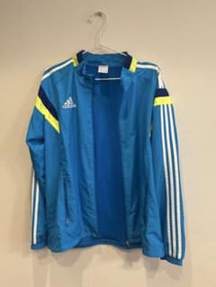 adidas アディダス日興証券ピステ・ウィンドブレーカー adidas アディダス ピステ ウィンドブレーカー XO 青 ジャージ刺繍ロゴ