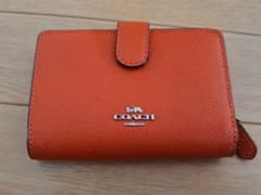 COACH 二つ折り財布 オレンジのサムネイル