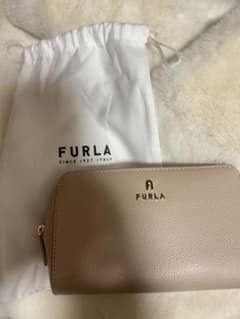 FURLA ベージュ レザーポーチ 保存袋付きのサムネイル