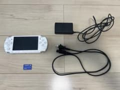 SONY PSP 2000 console, white, with AC adapter and Memory Stick.