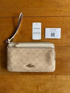新品タグ付 COACH ダブル ジップ ウォレット・シグネチャー キャンバス 