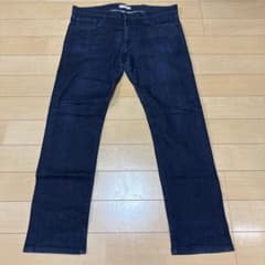 UNIQLO ダークブルーデニムパンツ 35サイズのサムネイル