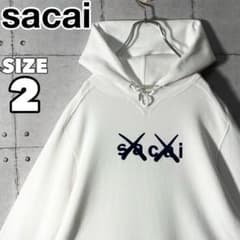即完売】サカイsacai☆カウズKAWSコラボアートロゴスウェットパーカー