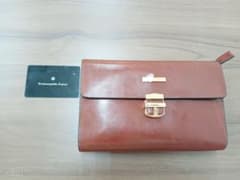 Almost new Ermenegildo Zegna brown leather clutch bag.