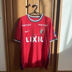 鹿島アントラーズ 鈴木優磨ユニフォーム 肉SHOCK! Lサイズ - メルカリ