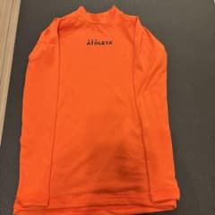 ATHLETA インナーシャツ オレンジ Mサイズのサムネイル
