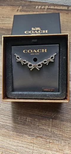 ☆COACH リボン型ネックレス☆のサムネイル