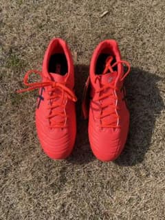 ASICS サッカーシューズ オレンジのサムネイル