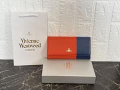 【新品未使用・箱&ショッパーつき】長財布 マルチカラーのサムネイル