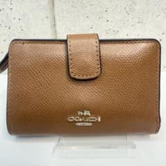 マ*カ様 COACH ブラウン 二つ折り財布 レザー コーナージップのサムネイル