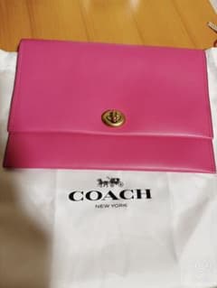 COACH 二つ折りポーチピンク ターンロックのサムネイル