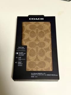 コーチiPhone17プロ用ケース SIGNATURE Brown 手帳型 - メルカリ