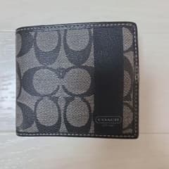 COACH 二つ折り財布 シグネチャー柄のサムネイル