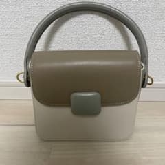 Olu. オルドット バイカラーショルダーバッグ