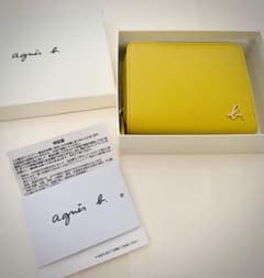 【新品 未使用 保証書付き】agnes b. 二つ折り財布 イエローのサムネイル