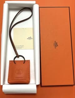 新品】HERMES エルメスチャーム orange shopper charm - メルカリ