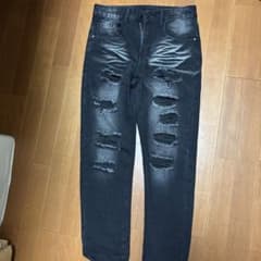 Distressed black denim pants